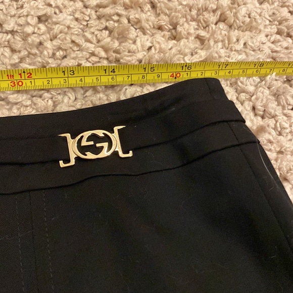 Black Gucci mini skirt with two silver GGs that rest on your back hips. With bag - Picture 7 of 10